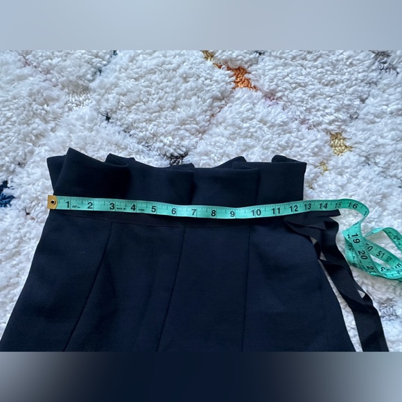 Elegant Black Pleated Skirt - Picture 2 of 3